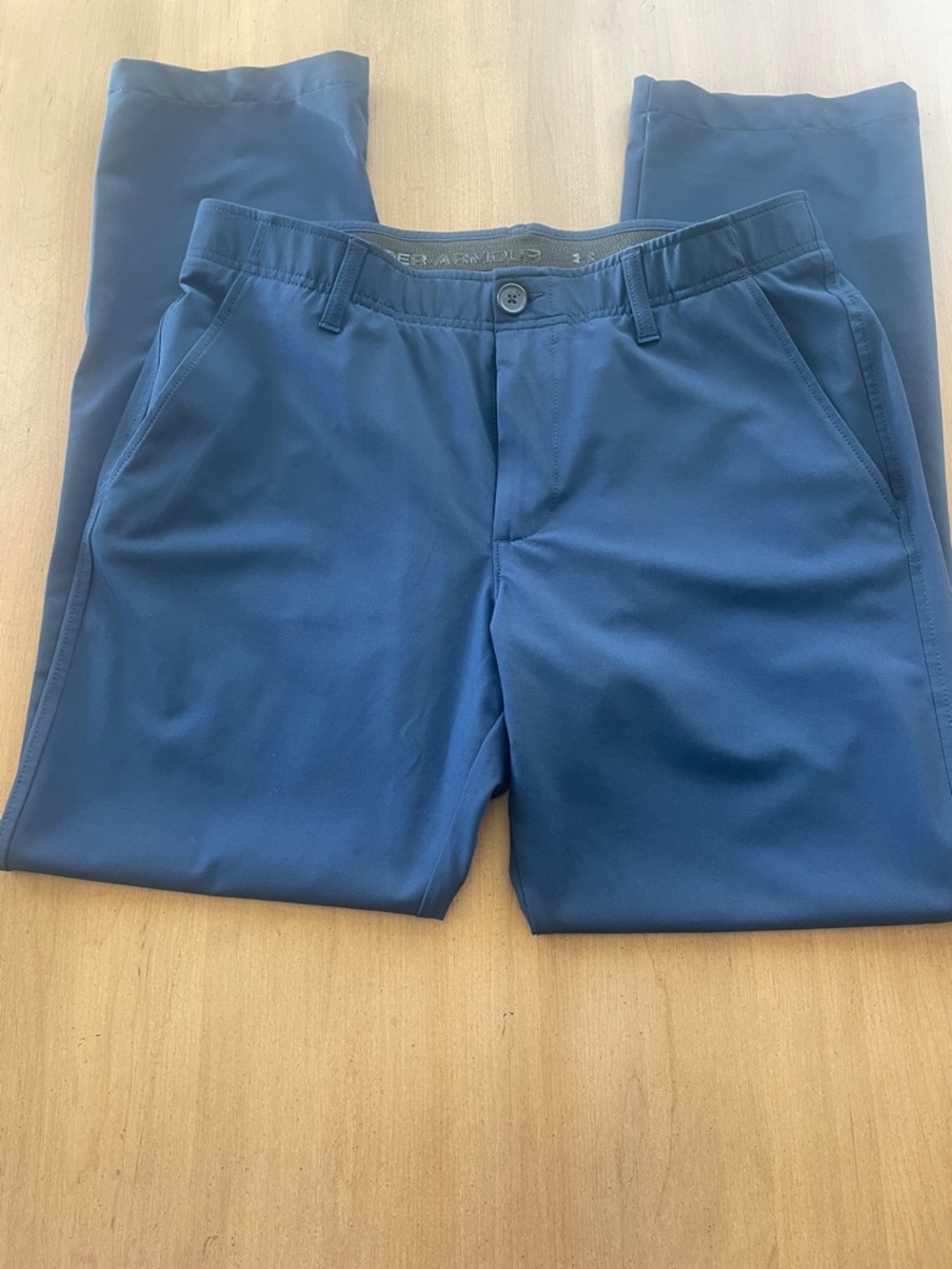 34/30 Under Armour Navy golf/casual pants.  Very good condition!